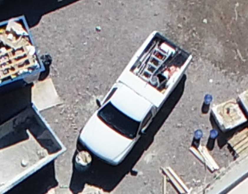 Now, look at the truck above. This was flown at a higher altitude, but is slightly sharper. Note how easy it is to discern the individual rungs in the ladder.