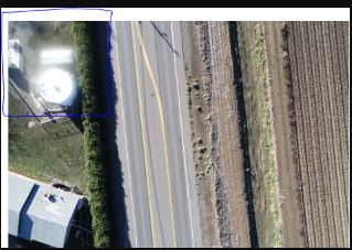 This camera has debris on the lens, causing a portion of the image to be blurry in every photograph.